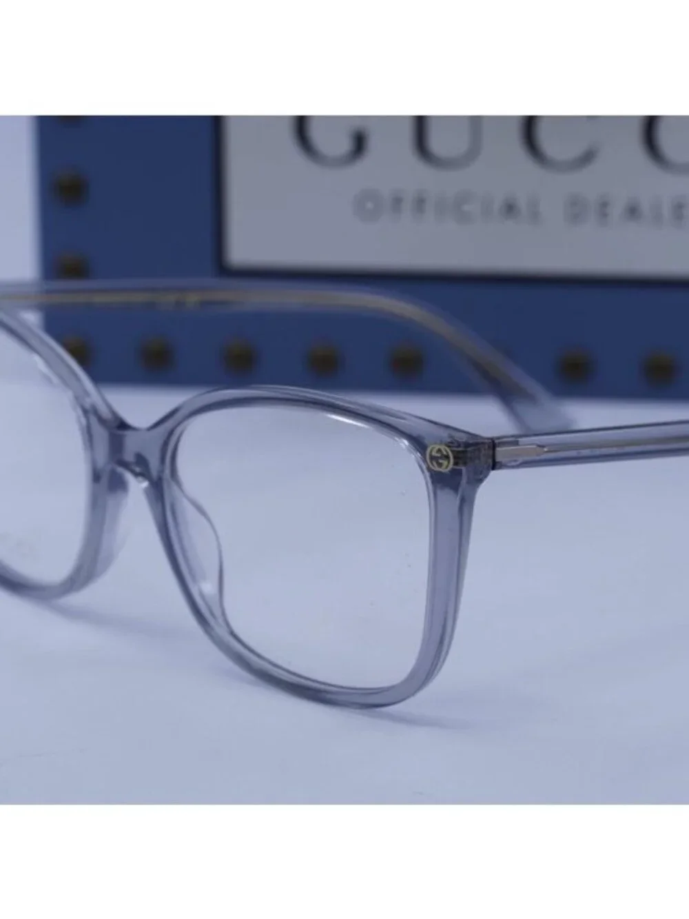 Gucci GG0026O 017 Cat Eye Eyeglasses - Shiny Transparent Denim Blue 53mm
